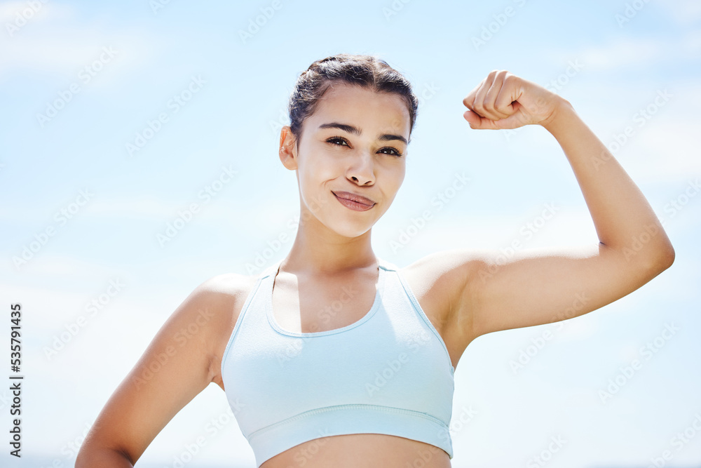 Sticker Strong woman flexing arms, body and muscle power, fitness and wellness training on blue sky Colombia outdoors. Portrait proud female athlete, motivation and healthy goals of winner sports achievement