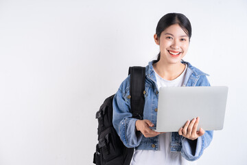 Portrait of Asian student on background
