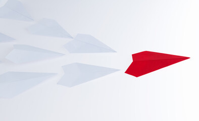 The red origami plane is leader