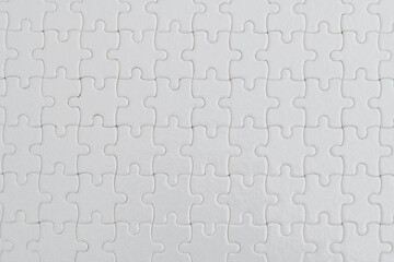 Close up of white jigsaw puzzle