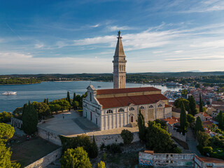 St. Euphemia church bell tower dominating the town of Rovinj surrounded by sea.
