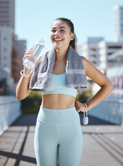 Fitness, tired and water bottle of woman in urban city portrait happy with workout results or...