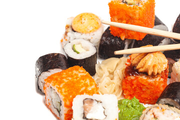 Sushi rolls japanese food with chopsticks isolated on white