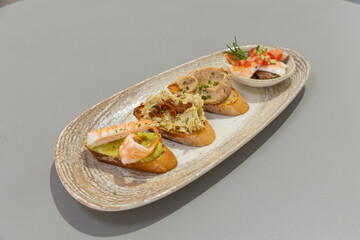 Seafood bruschetta served on a plate