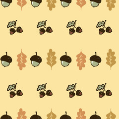 Cute hand-drawn acorns and oak leaves seamless pattern, a fall season yellow background