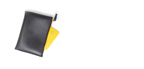 blank yellow credit card in leather wallet on white background. copy space