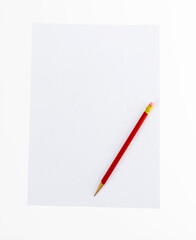 Pencil and blank paper on white background