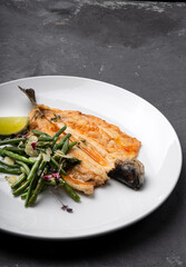 Fish baked with vegetables