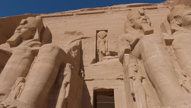 Entrance to Temple of Ramesses II and colossal statues in Abu Simbel, close exterior