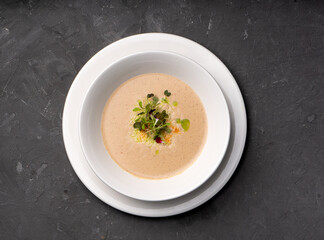 Vegetable cream soup with microgreens