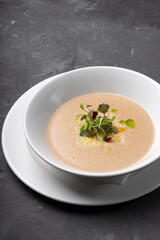 Vegetable cream soup with microgreens