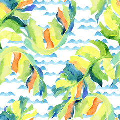 Fototapeta na wymiar Colorful watercolor banana leaves on sea waves background. Seamless tropical pattern