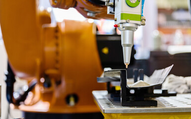 Robotic arm for engraving in factory