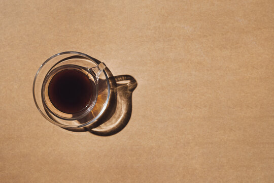 Single glass coffee cup in flat lay image