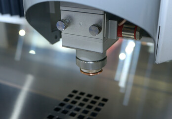 CNC plasma cutting machine working cut metal sheet