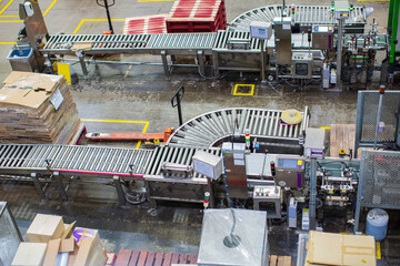 Top view crossing of the roller and conveyor treatment at shampoo plant