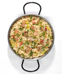 country paella with bacon and pork.