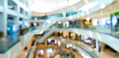 Defocused blur of people on shopping mall