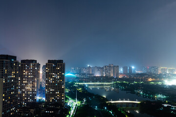 Fototapeta na wymiar Modern apartments in the city at night