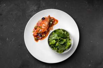 Chicken fillet stuffed with vegetables in tomato sauce