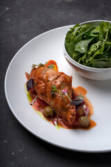 Chicken fillet stuffed with vegetables in tomato sauce