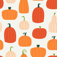 Seamless autumn pattern with various pumpkins. Vector cute halloween background.