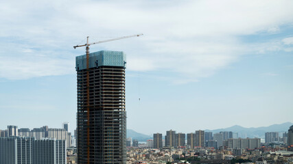 Unfinished building under cloud sky