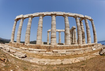 Fisheye view of ruins of the Temple of Poseidon at Cape Sounion near Athens, Greece. c 440 BC