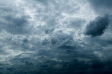 Naklejka na ściany i meble Dramatic sky with dark clouds