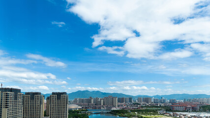 Modern city under cloudy sky