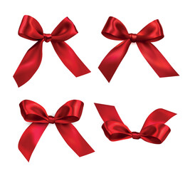 Set of vector realistic shiny decorative red bows isolated on white background