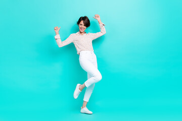Fototapeta na wymiar Full length photo of positive satisfied lady rejoice celebrate success achievement sale dance empty space isolated on cyan color background