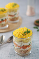 Mimosa salad in transparent glass