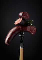 Black pudding or blood sausage with rosemary.