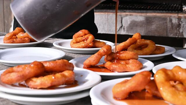 Street food preparation - traditional Peruvian sweets picarones