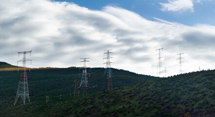 High electric towers on the mountain