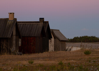 Twilight over fishing cabins at Helgumannen fishing village on Fårö, Gotland