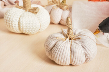 creating DIY Halloween decorations, fabric pumpkins and knitted pumpkins