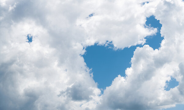 Heart shape in the middle of the white cloud