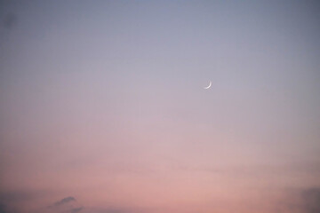 evening sky background with small crescent moon