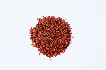Rice with red kernel heap  white background.