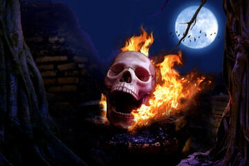 The skull was on fire on Halloween night, there was a moon. Halloween concept	
