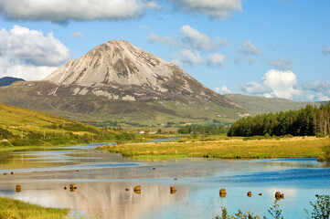 From Gweedore to white quartzite scree slopes of Errigal, County Donegal, Ireland. Lough Nacung and River Clady in foreground.