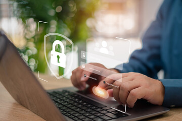 Cybersecurity internet and networking concept. Businessman use laptops and log in to security and encryption Security system in the personal internet system and data on laptops virtual interfaces.