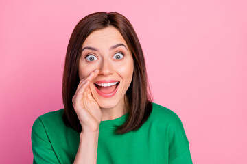 Closeup photo of young surprised lady talk about secret sale shopping mall tomorrow isolated on pink color background