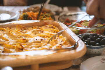 Baked vegetables served in trays, cozy homemade food.