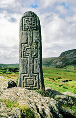 Celtic Christian stone carving in Glencolumbkille on the Wild Atlantic Way, Donegal, Ireland. One...