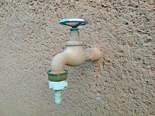 Water faucet, valve, old, with plastic extension