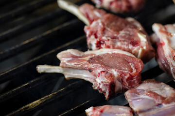 Closeup of grilling pork ribs, homemade barbecue.