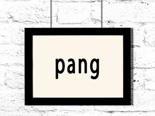 Black frame hanging on white brick wall with inscription pang - obrazy, fototapety, plakaty